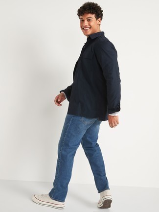 Blue Shirt Jacket Outfits For Men: For a casual outfit, pair a blue shirt jacket with blue jeans — these items fit pretty good together. Finishing off with a pair of white canvas high top sneakers is an effective way to bring a laid-back feel to your look.