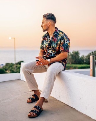 Beige Linen Chinos Outfits: Marrying a navy floral short sleeve shirt with beige linen chinos is an awesome pick for a casual look. Amp up this outfit with a pair of black leather sandals.