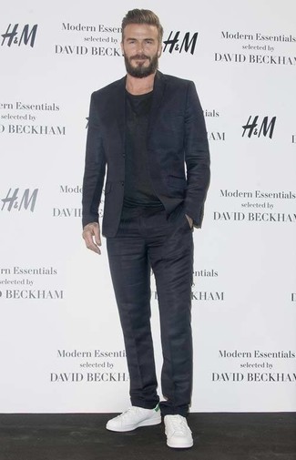 David Beckham wearing Navy Suit, Black Crew-neck T-shirt, White Leather Low Top Sneakers