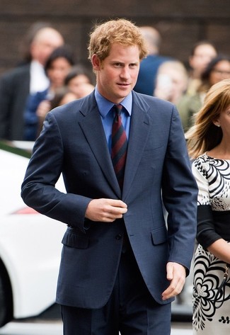 Prince Harry wearing Navy Suit, Blue Dress Shirt, Red and Navy Vertical Striped Tie