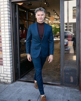 Tobacco Turtleneck Outfits For Men: A tobacco turtleneck and a navy suit are a refined outfit that every sharp man should have in his sartorial arsenal. The whole look comes together brilliantly if you introduce brown suede loafers to the equation.