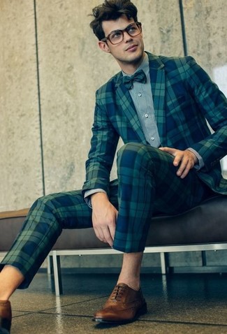 Mint Bow-tie Outfits For Men: A navy plaid suit and a mint bow-tie are the kind of casual must-haves that you can wear for years to come. Add a pair of tan leather brogues to the mix to instantly shake up the ensemble.