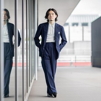 Navy Suit Outfits: For an ensemble that's city-style-worthy and effortlessly sleek, rock a navy suit with a grey polo. Take this look down a classier path with black leather loafers.