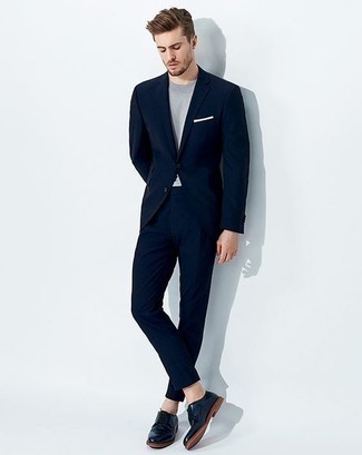 Navy Leather Derby Shoes Outfits: This outfit clearly illustrates it pays to invest in such menswear items as a navy suit and a light blue crew-neck t-shirt. A pair of navy leather derby shoes effortlessly lifts up the ensemble.