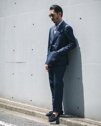 Navy Vertical Striped Suit Outfits: A navy vertical striped suit looks so refined when worn with a light blue vertical striped dress shirt for an outfit worthy of a real gent. All you need is a nice pair of black suede tassel loafers to complete your ensemble.
