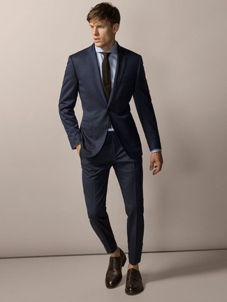 Tobacco Leather Brogues Outfits: Team a navy suit with a light blue dress shirt to look like a dapper gent. Go ahead and introduce tobacco leather brogues to the mix for a mellow vibe.