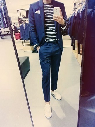 Blue Suit with Low Top Sneakers Outfits: This classic and casual combination of a blue suit and a navy and white horizontal striped crew-neck t-shirt is extremely easy to put together in no time, helping you look sharp and ready for anything without spending a ton of time digging through your wardrobe. Avoid looking too formal by finishing with low top sneakers.