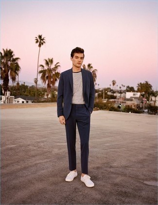 Navy Suit with White Canvas Low Top Sneakers Smart Casual Summer Outfits: A navy suit and a white and black horizontal striped crew-neck t-shirt are a wonderful pairing that will earn you the proper amount of attention. Feel somewhat uninspired with this ensemble? Let white canvas low top sneakers mix things up. If you're thinking of a season-appropriate look, here is a great one.