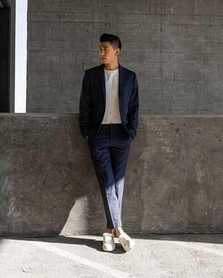 White Low Top Sneakers with Suit Smart Casual Outfits: Such staples as a suit and a white crew-neck t-shirt are the ideal way to inject extra polish into your current arsenal. Throw a pair of white low top sneakers in the mix to infuse a sense of stylish nonchalance into your look.