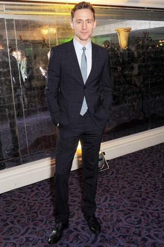 Tom Hiddleston wearing Navy Check Suit, White Dress Shirt, Black Leather Derby Shoes, Light Blue Check Tie