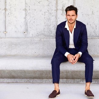Navy Suit Warm Weather Outfits: Dapper up in a navy suit and a white dress shirt. A pair of dark brown suede loafers instantly ups the appeal of this ensemble.
