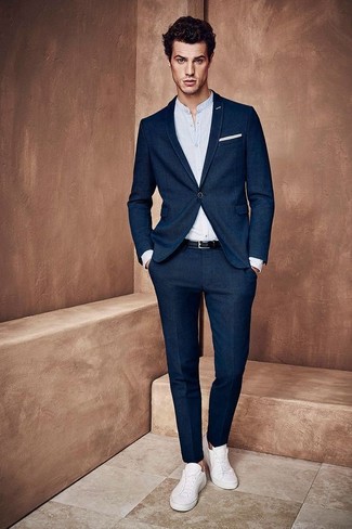 Navy Suit with White Leather Low Top Sneakers Outfits: This is hard proof that a navy suit and a white dress shirt look awesome when paired up in a polished look for a modern gentleman. For something more on the daring side to complement this ensemble, add white leather low top sneakers to the equation.