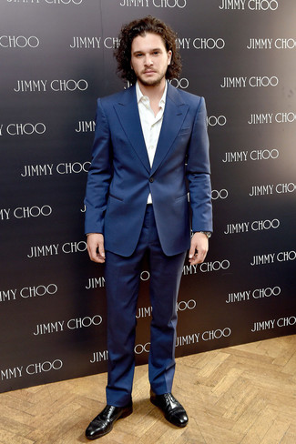Kit Harington wearing Navy Suit, White Long Sleeve Shirt, Black Leather Derby Shoes