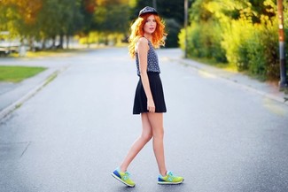 Athletic Shoes Outfits For Women: If you're facing a sartorial situation where comfort is essential, this combination of a navy print tank and a navy skater skirt is a no-brainer. Finishing off with a pair of athletic shoes is a surefire way to inject a dash of casualness into your ensemble.