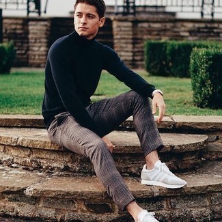 Brown Plaid Chinos Outfits: To pull together a relaxed ensemble with a modern spin, wear a navy turtleneck and brown plaid chinos. For a more casual feel, introduce a pair of beige athletic shoes to this look.