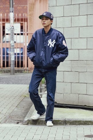 Men's Navy Print Varsity Jacket, Navy Jeans, White and Black Canvas High Top Sneakers, Navy and White Print Baseball Cap