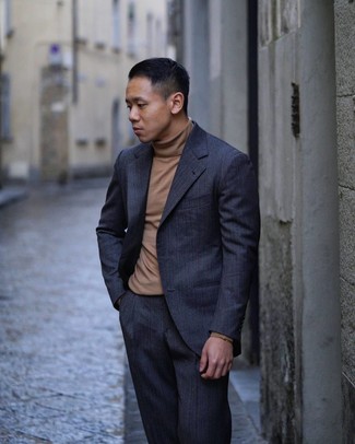 Tobacco Turtleneck Outfits For Men: We're loving how this classic and casual pairing of a tobacco turtleneck and a navy vertical striped suit instantly makes you look seriously stylish.