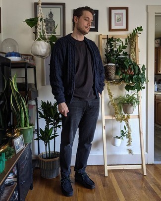 Black Jeans Outfits For Men: If the setting permits casual styling, opt for a navy knit zip sweater and black jeans. Bring an elegant twist to this ensemble by finishing with black suede desert boots.