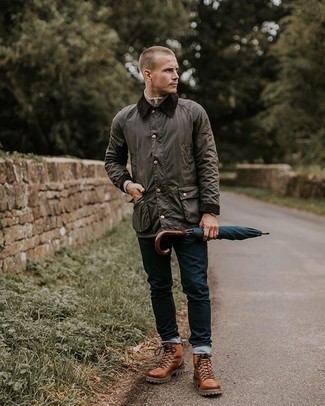 Tan Zip Neck Sweater Outfits For Men: This combo of a tan zip neck sweater and navy jeans makes for the ultimate off-duty outfit for any gentleman. Take the casual route in the footwear department by wearing brown leather work boots.