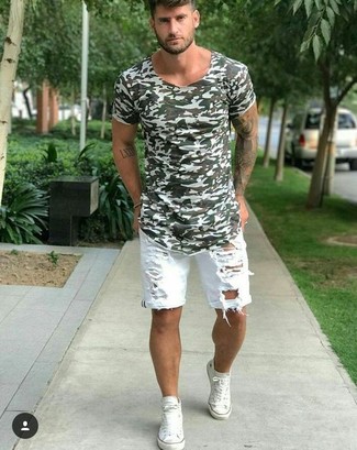 Dark Green Crew-neck T-shirt Outfits For Men: Consider pairing a dark green crew-neck t-shirt with white ripped denim shorts for both stylish and easy-to-style ensemble. A pair of white canvas high top sneakers will be a stylish complement for this ensemble.