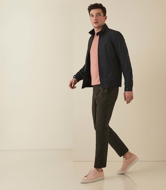 Men's Pink Leather Low Top Sneakers, Olive Chinos, Pink Crew-neck T-shirt, Black Harrington Jacket