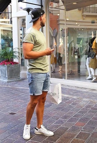 Light Blue Denim Shorts Outfits For Men: If you prefer casual style, why not make an olive crew-neck t-shirt and light blue denim shorts your outfit choice? We're loving how a pair of white leather low top sneakers makes this getup whole.
