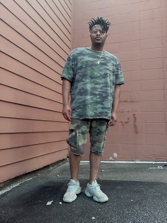 Olive Camouflage Crew-neck T-shirt Outfits For Men: Why not make an olive camouflage crew-neck t-shirt and olive camouflage shorts your outfit choice? Both items are totally functional and look nice matched together. And it's a wonder what mint athletic shoes can do for the outfit.