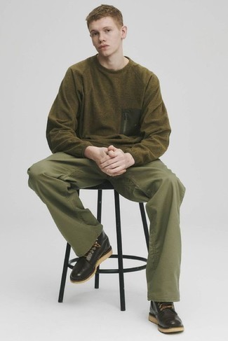 Casual Boots Outfits For Men: This relaxed casual combination of an olive fleece sweatshirt and olive chinos is very easy to put together in next to no time, helping you look awesome and ready for anything without spending a ton of time rummaging through your wardrobe. Go ahead and introduce casual boots to the equation for a dash of elegance.