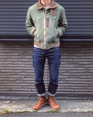Olive Harrington Jacket Outfits: Wear an olive harrington jacket and navy jeans for standout menswear style. To add more class to your ensemble, finish off with a pair of tobacco leather casual boots.