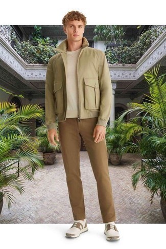 Olive Harrington Jacket Outfits: An olive harrington jacket and brown chinos are a good combination that will take you throughout the day. To infuse a sense of stylish casualness into this look, introduce white and brown athletic shoes to the equation.
