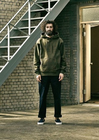 Olive Hoodie Outfits For Men: You'll be surprised at how extremely easy it is for any man to get dressed like this. Just an olive hoodie and navy chinos. Complement your outfit with a pair of navy canvas slip-on sneakers and you're all set looking dashing.