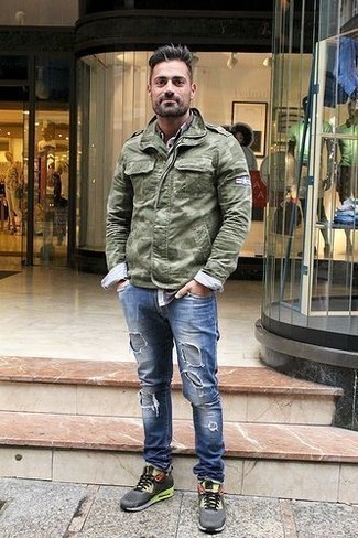 Olive Camouflage Military Jacket Outfits For Men: If you gravitate towards city casual ensembles, why not reach for an olive camouflage military jacket and blue ripped jeans? Go the extra mile and break up your look by sporting a pair of charcoal athletic shoes.