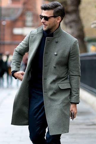 Pair an olive overcoat with navy chinos to create a neat and sophisticated ensemble.