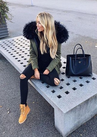 500+ Relaxed Outfits For Women: This combo of an olive parka and black ripped skinny jeans is proof that a pared down casual outfit doesn't have to be boring. Tan nubuck lace-up flat boots work wonderfully well within this ensemble.