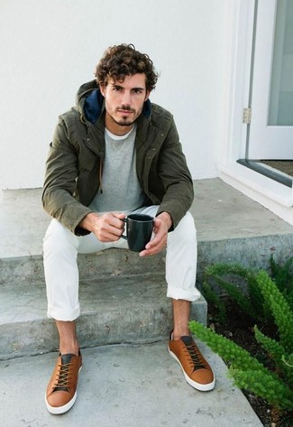 Dark Green Parka Outfits For Men: Pair a dark green parka with white chinos for relaxed dressing with a fashionable spin. Rounding off with a pair of brown plimsolls is an effortless way to give a dash of elegance to this outfit.