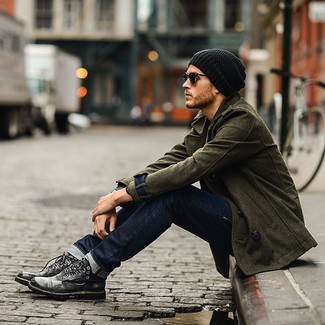 Charcoal Leather Casual Boots Outfits For Men: If the occasion calls for a polished yet kick-ass outfit, wear an olive pea coat with navy jeans. As for footwear, introduce a pair of charcoal leather casual boots to the equation.