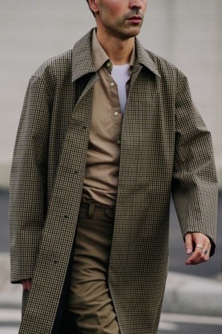 Dark Green Check Raincoat Outfits For Men: Uber stylish, this off-duty pairing of a dark green check raincoat and brown chinos provides with amazing styling possibilities.