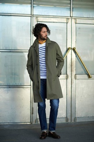 Dark Green Raincoat Outfits For Men: Show off your expertise in menswear styling in this casual pairing of a dark green raincoat and blue jeans. Complete your ensemble with a pair of dark brown leather loafers for an added touch of style.