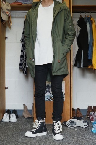 Olive Raincoat Outfits For Men: Try teaming an olive raincoat with black jeans for a cool and relaxed and stylish outfit. If you want to immediately dress down your ensemble with a pair of shoes, why not add a pair of black and white canvas high top sneakers to the mix?