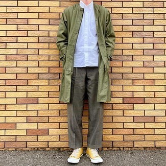 Yellow Canvas High Top Sneakers Outfits For Men: You'll be surprised at how easy it is to get dressed like this. Just an olive raincoat married with grey dress pants. For a more casual touch, why not complete your ensemble with a pair of yellow canvas high top sneakers?