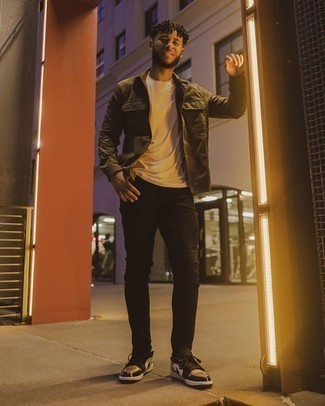 Black and Gold Leather Low Top Sneakers Outfits For Men: This pairing of an olive shirt jacket and black jeans is a safe bet for an absolutely stylish look. For shoes, you can follow the casual route with a pair of black and gold leather low top sneakers.