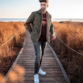 Burgundy Print Crew-neck T-shirt Outfits For Men: Go for a straightforward but casually dapper option pairing a burgundy print crew-neck t-shirt and grey jeans. White canvas low top sneakers look perfect rounding off this outfit.