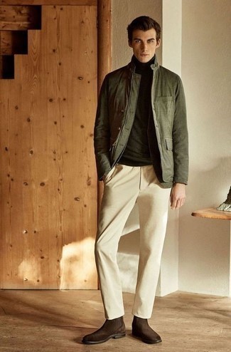Men's Outfits 2022: A semi-casual combo of an olive shirt jacket and beige chinos can be appropriate in a great deal of settings. To add more class to your ensemble, finish off with a pair of dark brown suede chelsea boots.