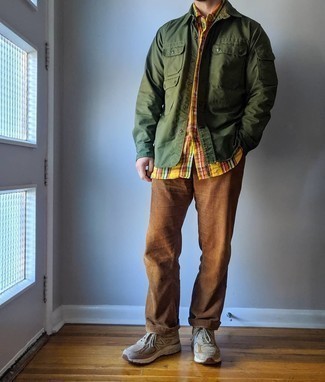 Dark Brown Corduroy Chinos Outfits: Nail the casually refined outfit in an olive shirt jacket and dark brown corduroy chinos. And if you wish to effortlessly play down your outfit with one single item, complement your getup with tan athletic shoes.