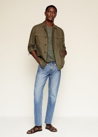 Olive Linen Shirt Jacket Outfits For Men: This pairing of an olive linen shirt jacket and light blue jeans is the ultimate relaxed casual style for any modern man. With footwear, go for something on the relaxed end of the spectrum by finishing with dark brown leather sandals.