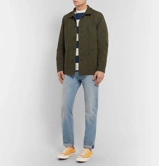 Yellow Low Top Sneakers Outfits For Men: You're looking at the definitive proof that an olive shirt jacket and light blue jeans look awesome when paired together in a casual getup. A pair of yellow low top sneakers effortlessly revs up the cool of your getup.