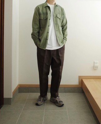 Olive Shirt Jacket Outfits For Men: This ensemble with an olive shirt jacket and dark brown chinos isn't so hard to pull off and easy to adapt throughout the day. Unimpressed with this outfit? Introduce grey athletic shoes to jazz things up.