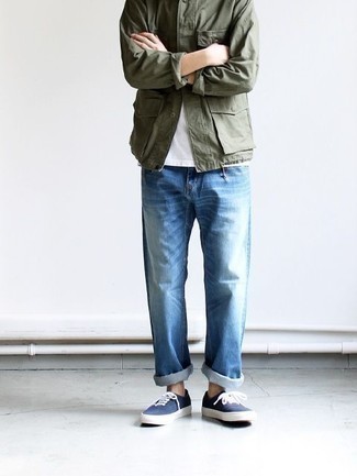Olive Shirt Jacket Outfits For Men: An olive shirt jacket and light blue jeans are amazing menswear staples that will integrate really well within your casual lineup. Feeling transgressive today? Jazz things up with navy canvas low top sneakers.