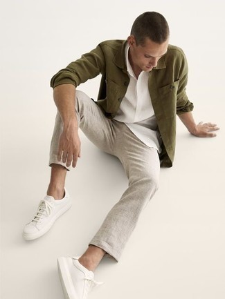 White and Black Short Sleeve Shirt Outfits For Men: If you don't like putting too much work into your getups, rock a white and black short sleeve shirt with grey chinos. If you're not sure how to round off, complement this getup with a pair of white leather low top sneakers.