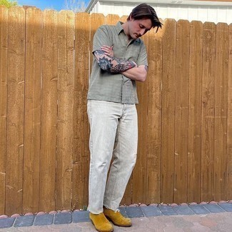 Tobacco Boots Outfits For Men: For a relaxed outfit, choose an olive short sleeve shirt and grey ripped jeans — these items fit really cool together. For something more on the classier end to complete your ensemble, complete this getup with tobacco boots.